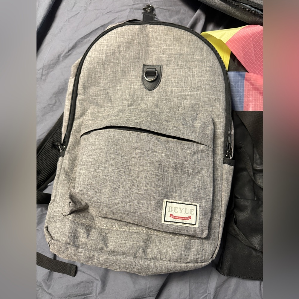 BEYLE Classic Grey Textured Backpack - Gently Used, Stylish and Practical